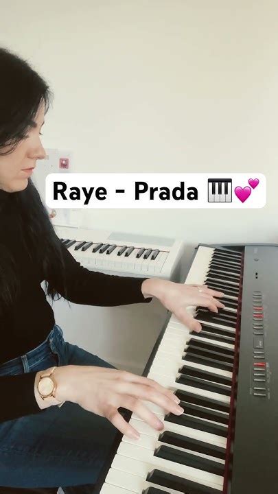 prada pianist|RAYE .